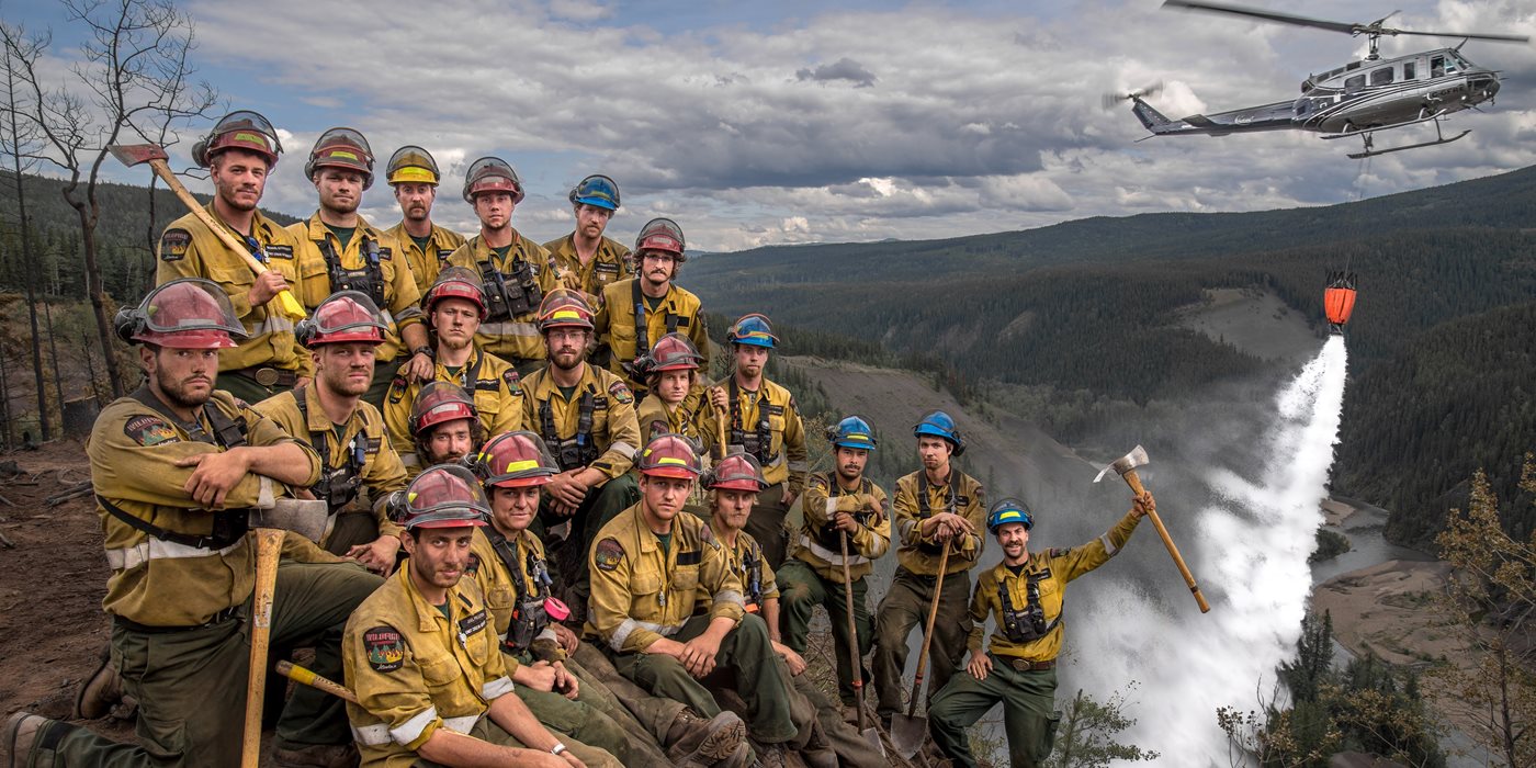 Harold Larson and his crew on site of a wildland bushfire near Peace River, Alberta.