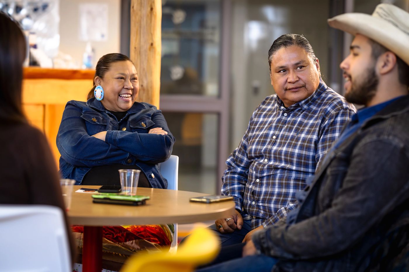 Three indigenous people speaking at NAIT campus