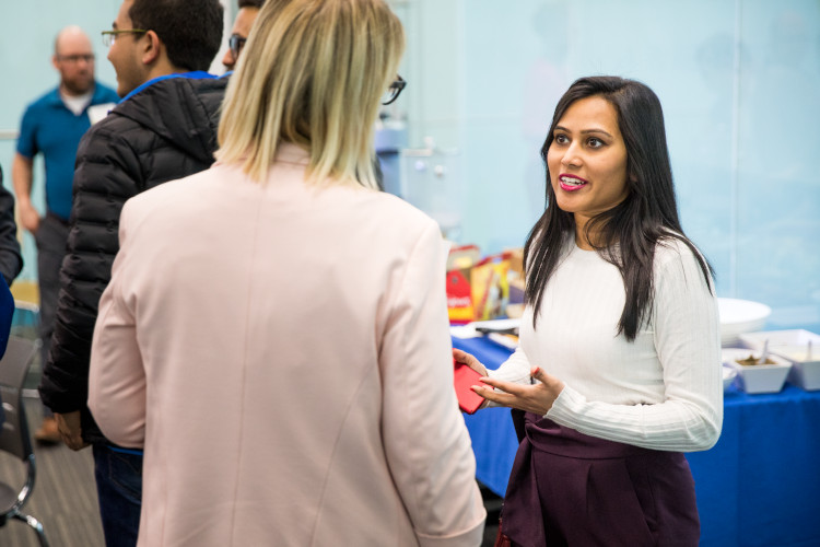 a student talking to their mentor in nonprofit management