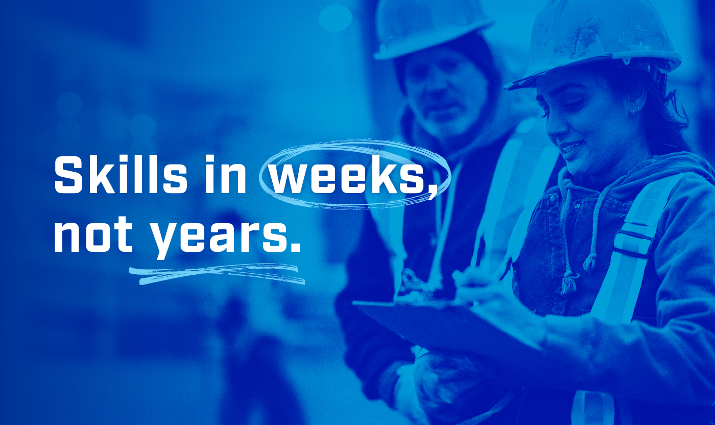 mature student working in the trades and learning from their mentor